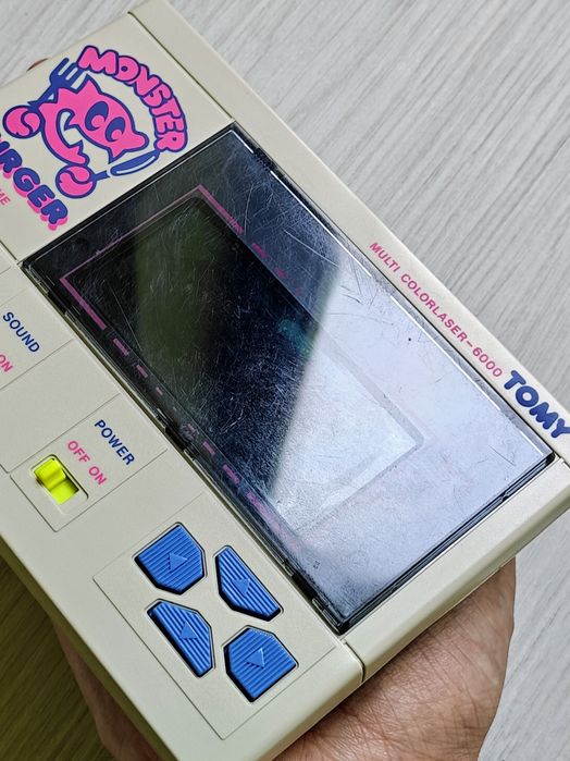 Consola de colecție TOMY/Grandstand Monster Burger LSI Game, din 1983