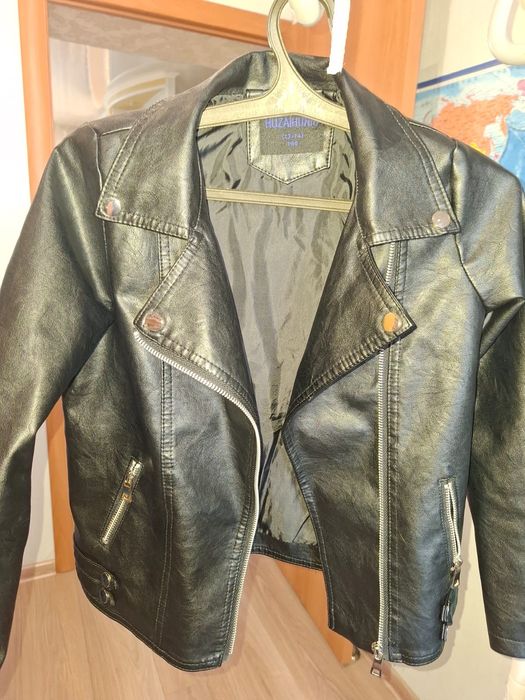 Продам детскую куртку-косуха.