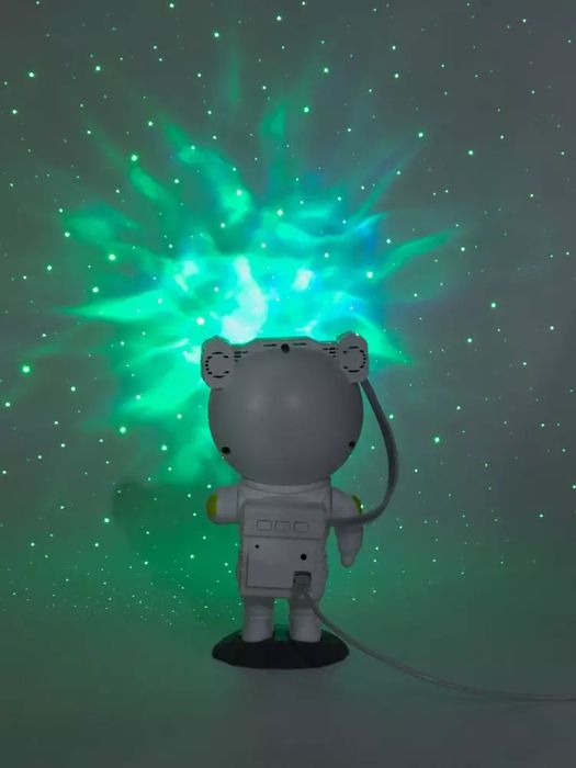 Bolalar uchun kosmonavt shaklidagi yulduzli osmon proyektori, masofada