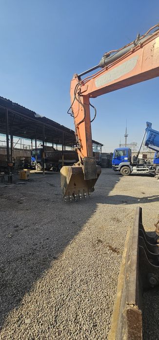 Доосан колёсный эксковатор 210 сотилади холати идеал 2014 йил апарат