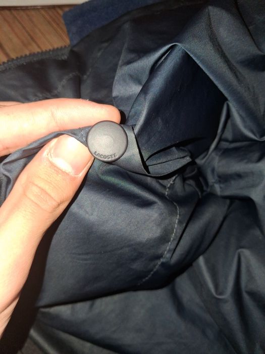 Пуховик лакоста.