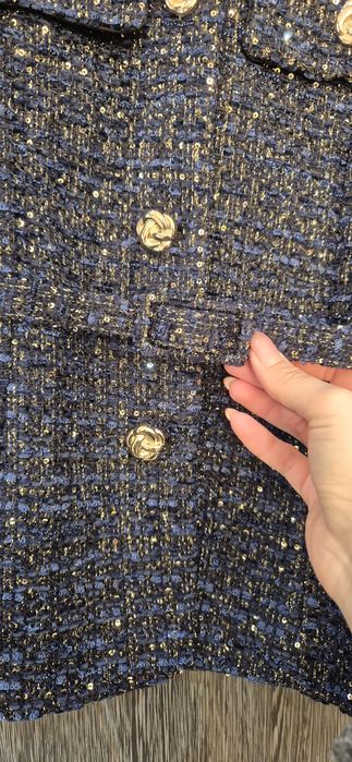 Стилен елек с деликатни лъскави честички