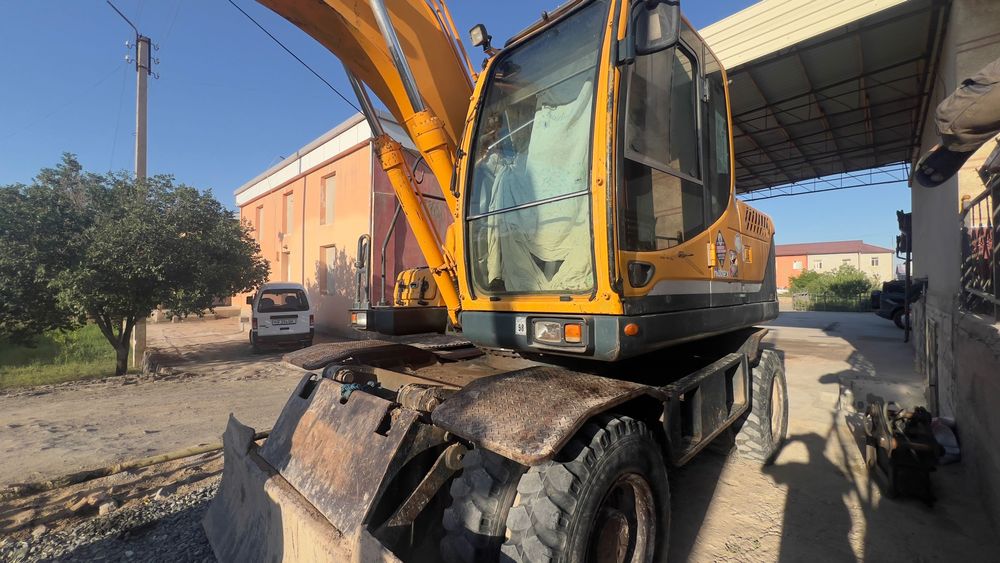 Ekskavator Hyundai 140 W. Экскаватор Хундай 140