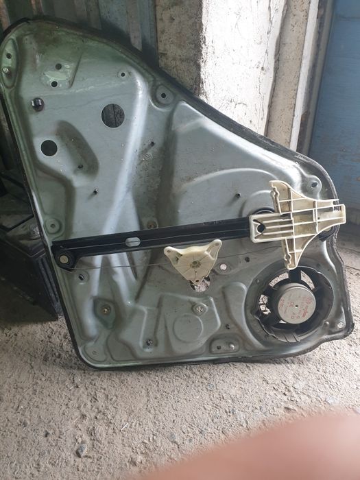 Стеклоподьемник оригинал VW B5 "дельфин"