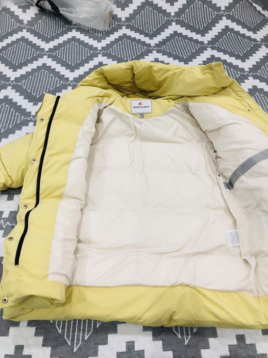 Куртка пуховик отличного качества.