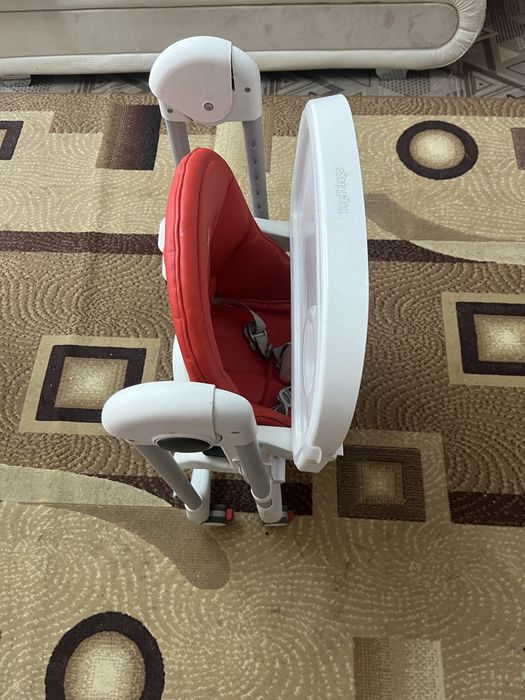 Продам коляску и стульчик для клрмления