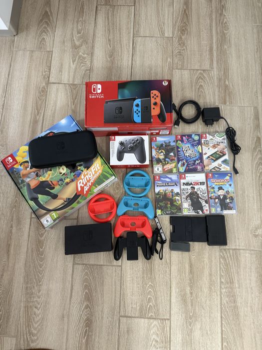 Pachet Nintendo Switch + Ring Fit + Pro Controller + 7 Jocuri (Ca NOU)