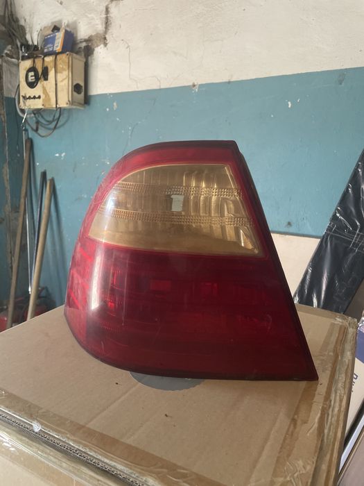 Toyta corolla2005 год фонарь задний левыии