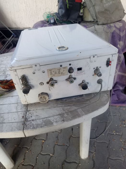 Продам газовую на стеную печь