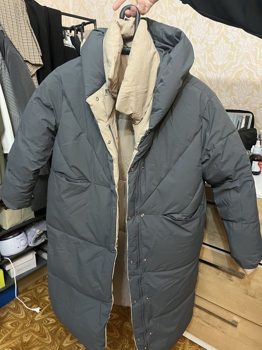 Продам зимний пуховик новый