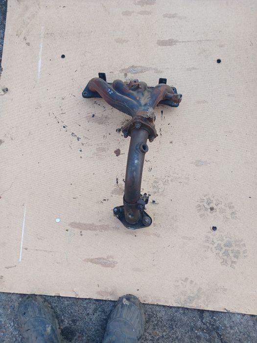 Коллектор Мазда 323 двигатель ZL