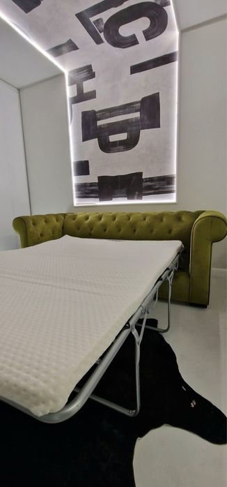 Canapea chesterfield