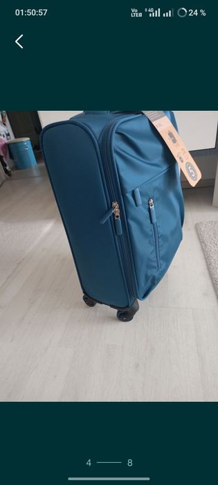 Vând troler material textil,dimensiune de 55 cm,nou, produs calitate.