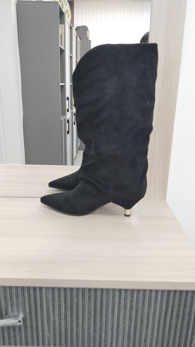 Продам новые сапоги