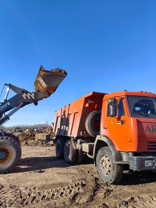 Погрузчик Фронтальный ковшовый.