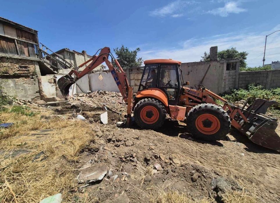 Услуги с комбиниран багер