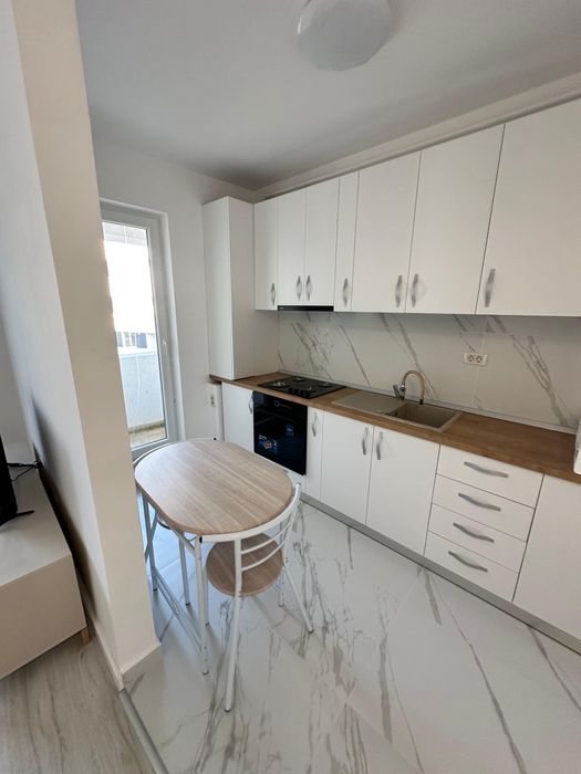 Garsoniera noua  de inchiriat + loc de parcare
