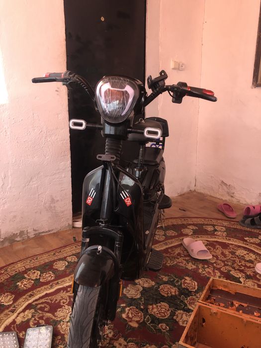 Скутер 100.000