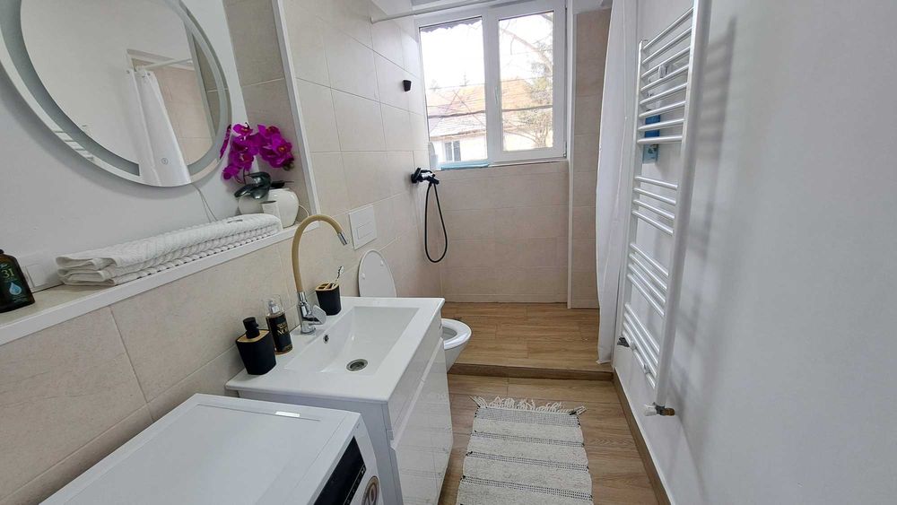 Vand apartament doua camere decomandat la casute