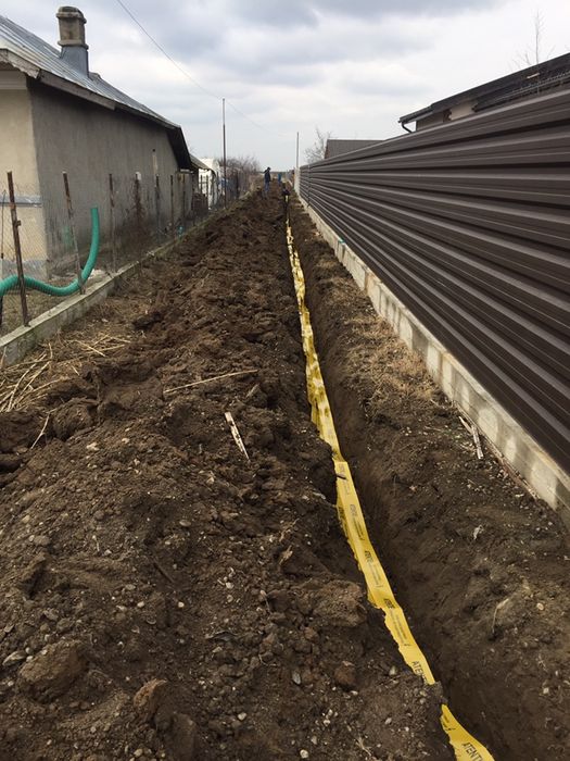 Lucrari cu buldo cu picon miniexcavator bobcat