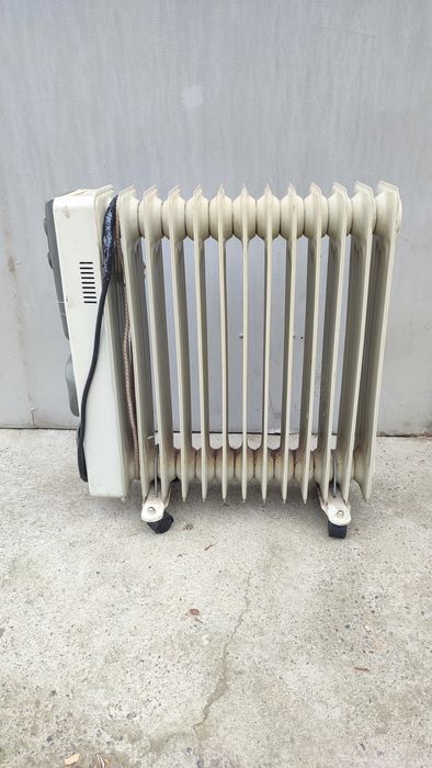Масляный радиатор с вентилятором все работает.