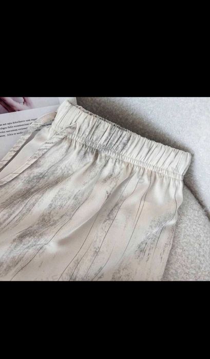 Pantaloni evazați/largi