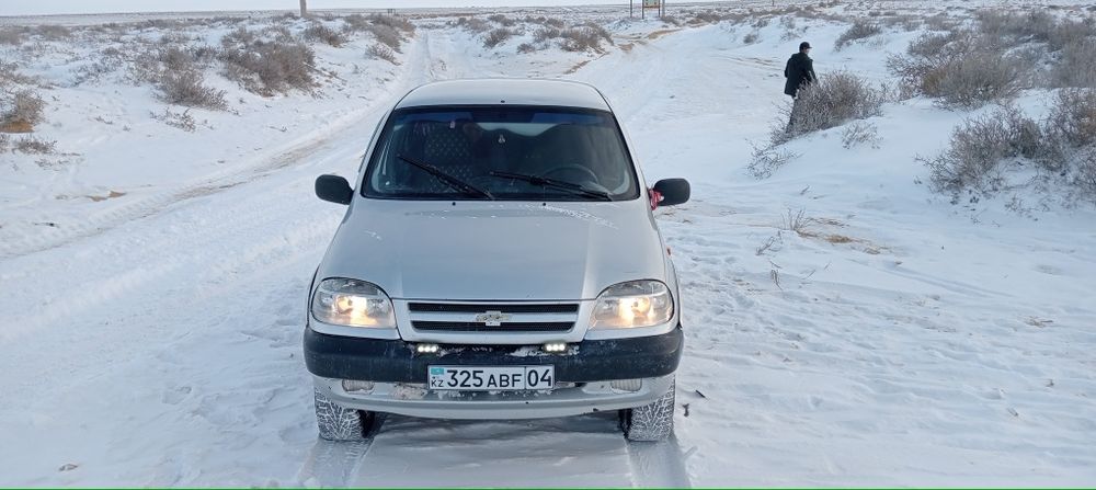 Шевролет     нива