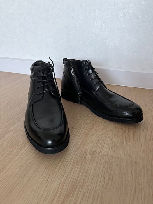 Продам новые зимние ботинки