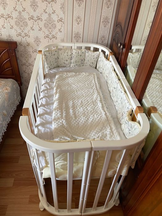 Детская кровать с маятником