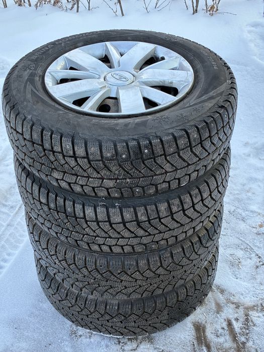 Комплект зимней резины на дисках и колпаках 185/70/14