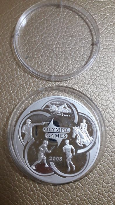 Колекционная манета,күміс