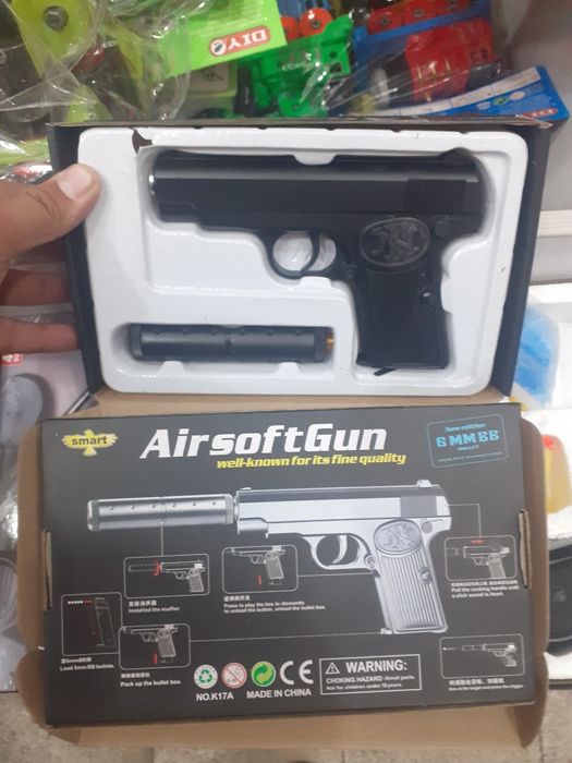 Игрушки Пистолет