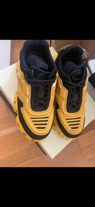 Кроссовки Prada желтые