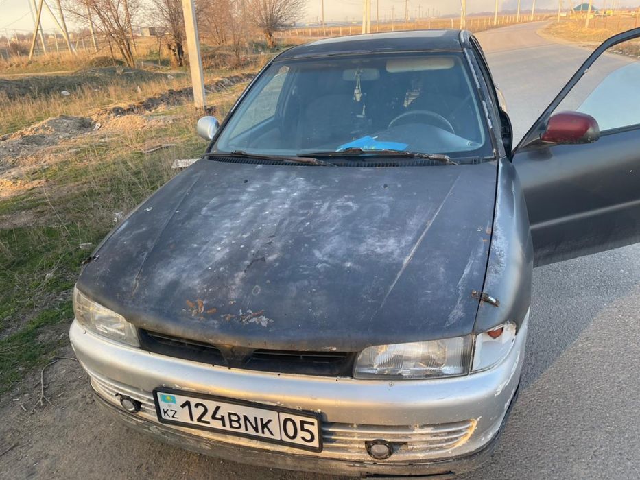 Машина Митсубиси Лансер