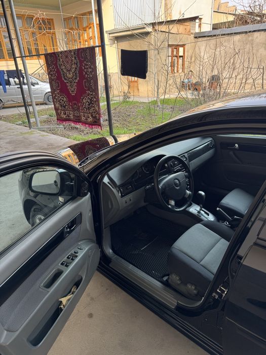 Gentra sotiladi 2023  qora 3 poz