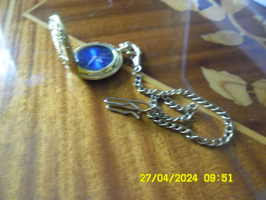 Продам:Монеты значки часы позолоченные.