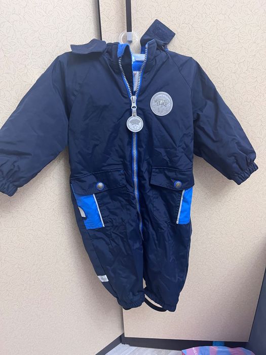 Продам демисезонный комбинезон Kerry