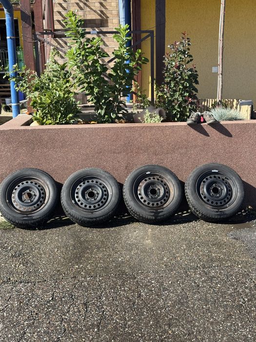 Jante originale BMW 15” + anvelope de iarnă Dunlop
