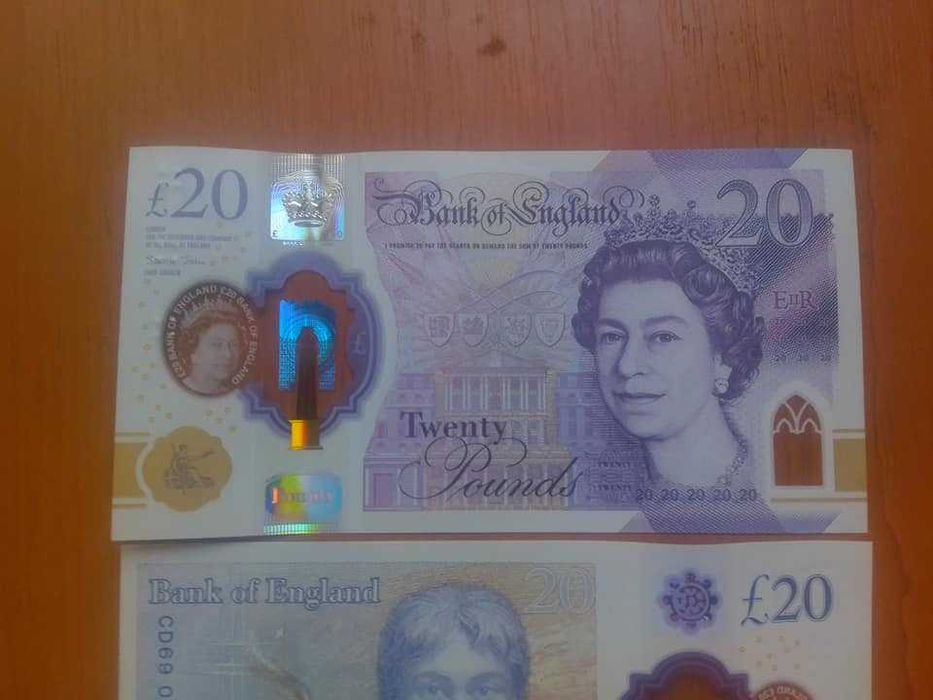 чисто нови банкноти 20 паунда , английски лири  кралица Елизабет