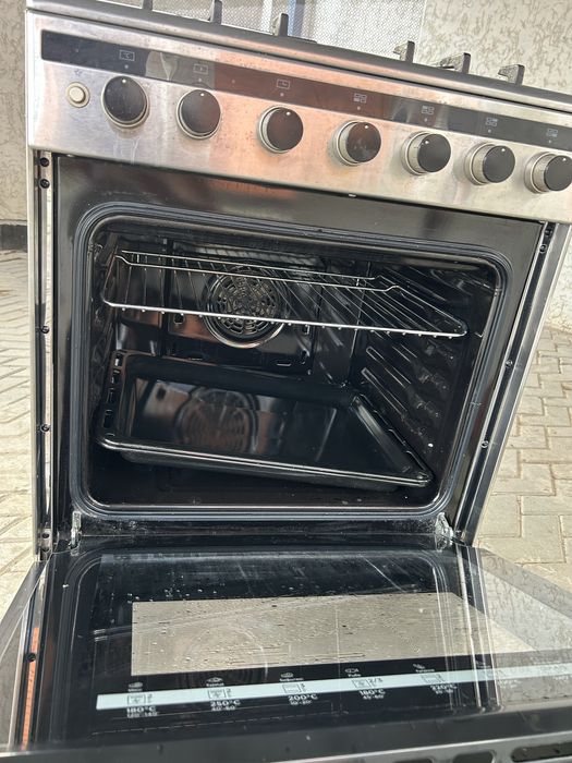 Газплита с эл. духовкой Midea