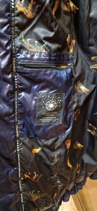 Теплый женский пуховик интересной модели