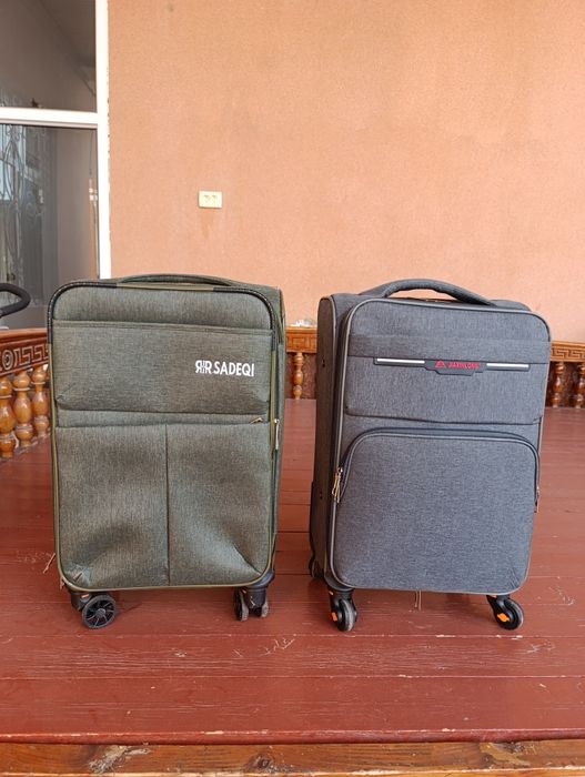 Чемадан четырёх колёсный