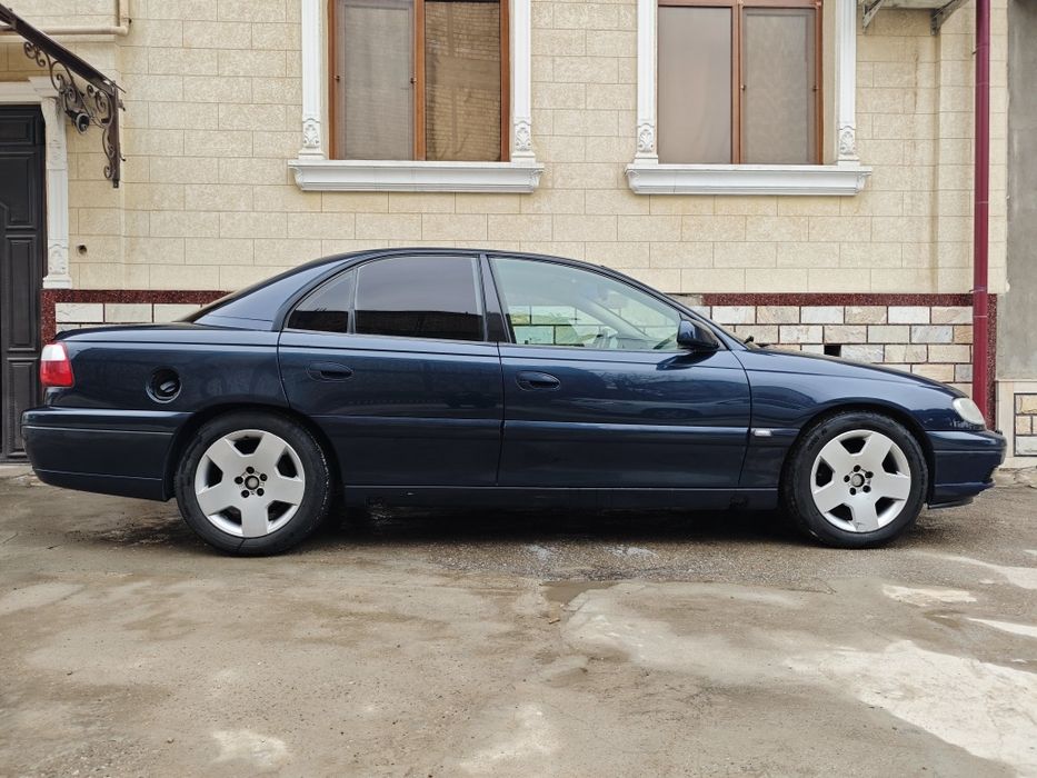 Opel Omega B 3.2 V6 2002 метан/бензин