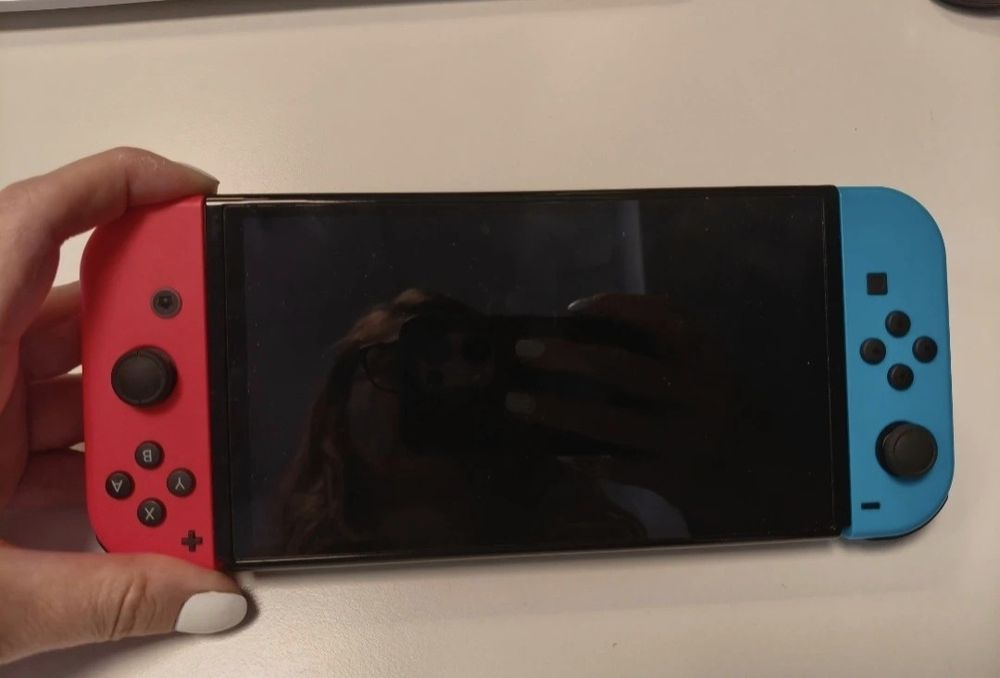 Nintendo Switch Oled, garantie si Nintendo Sports