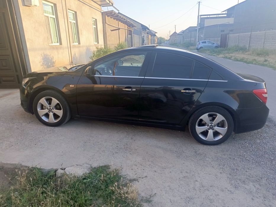 Ласетти Круз 2009 или  265000 йурган