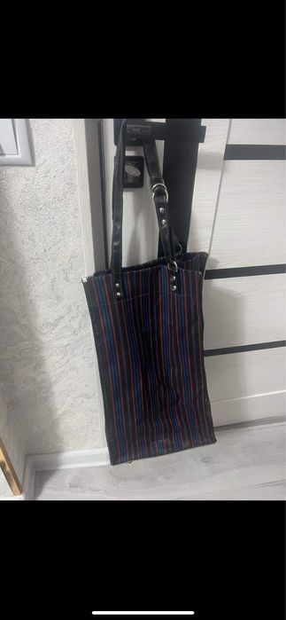 Очень удобная хозяйственная сумка на колёсиках.