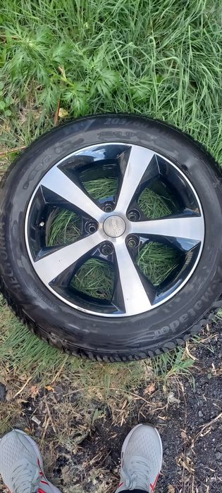 Продам титановые диский с резиной