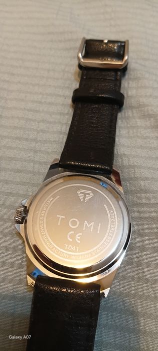 Продам часы Tomi