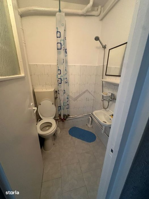 Garsoniera Alexandru etaj intermediar in bloc de apartamente