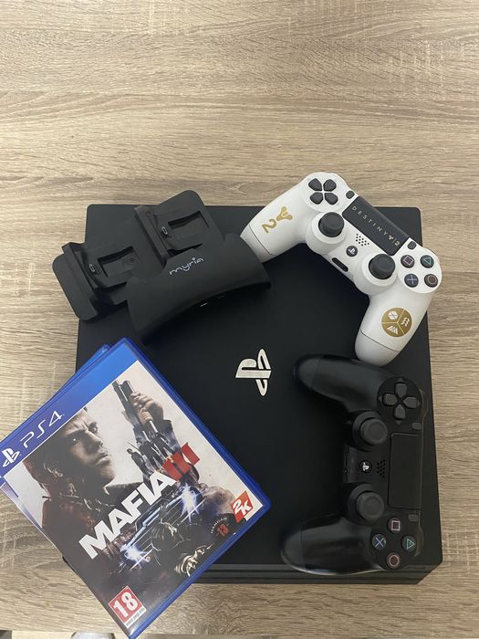 Ps 4 pro 1TB+2 controllere+2 jocuri+baterie externa+suport de incarcat